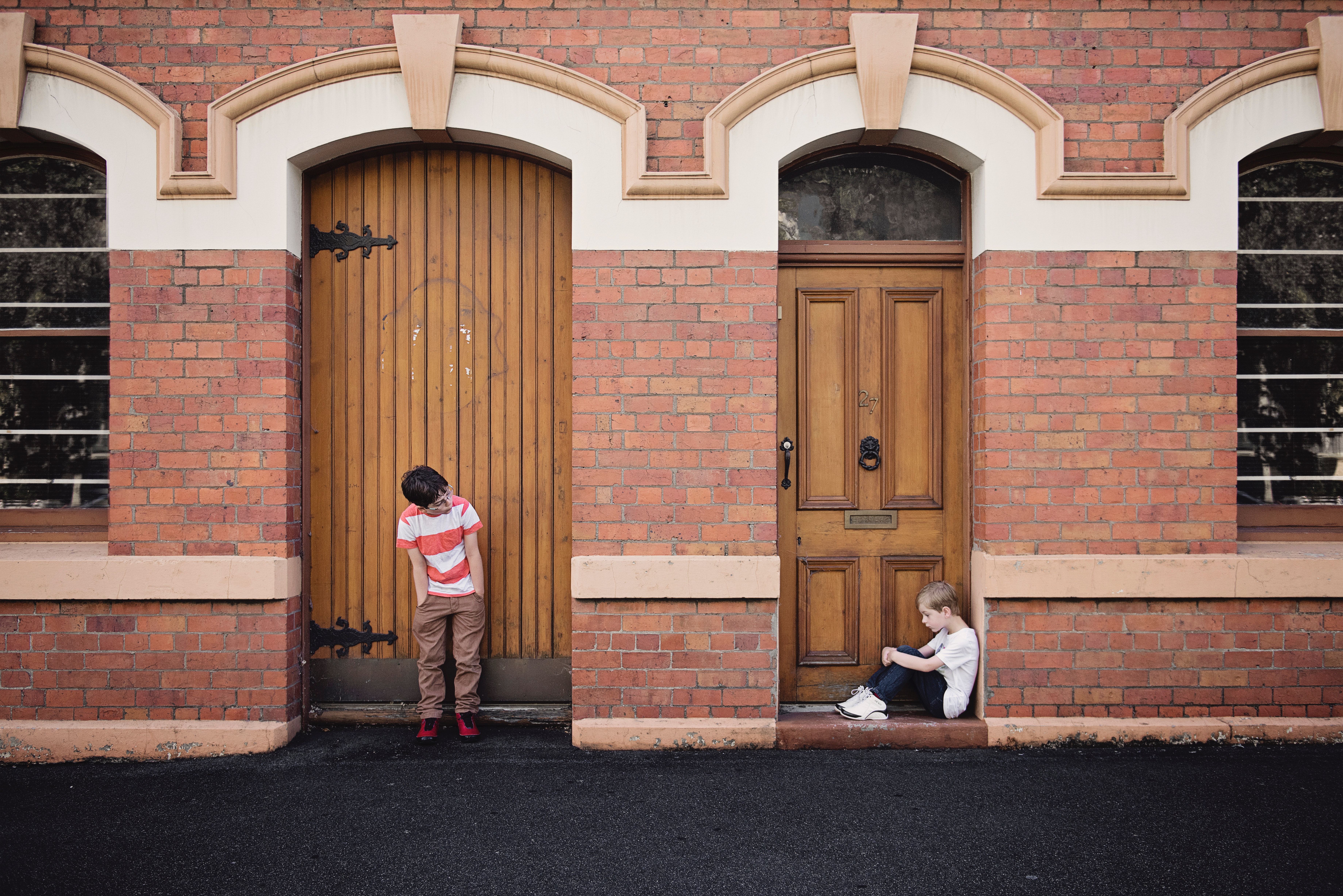 architecture-boys-brick-wall-551594