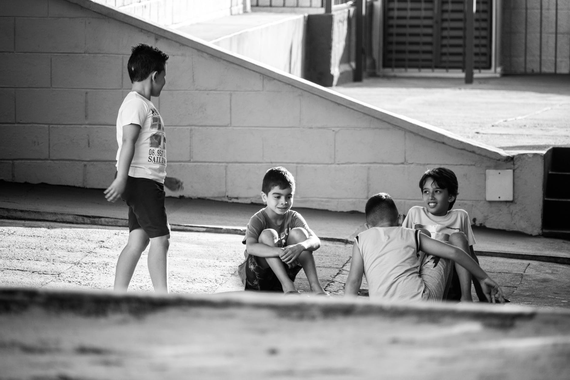 four boys playing